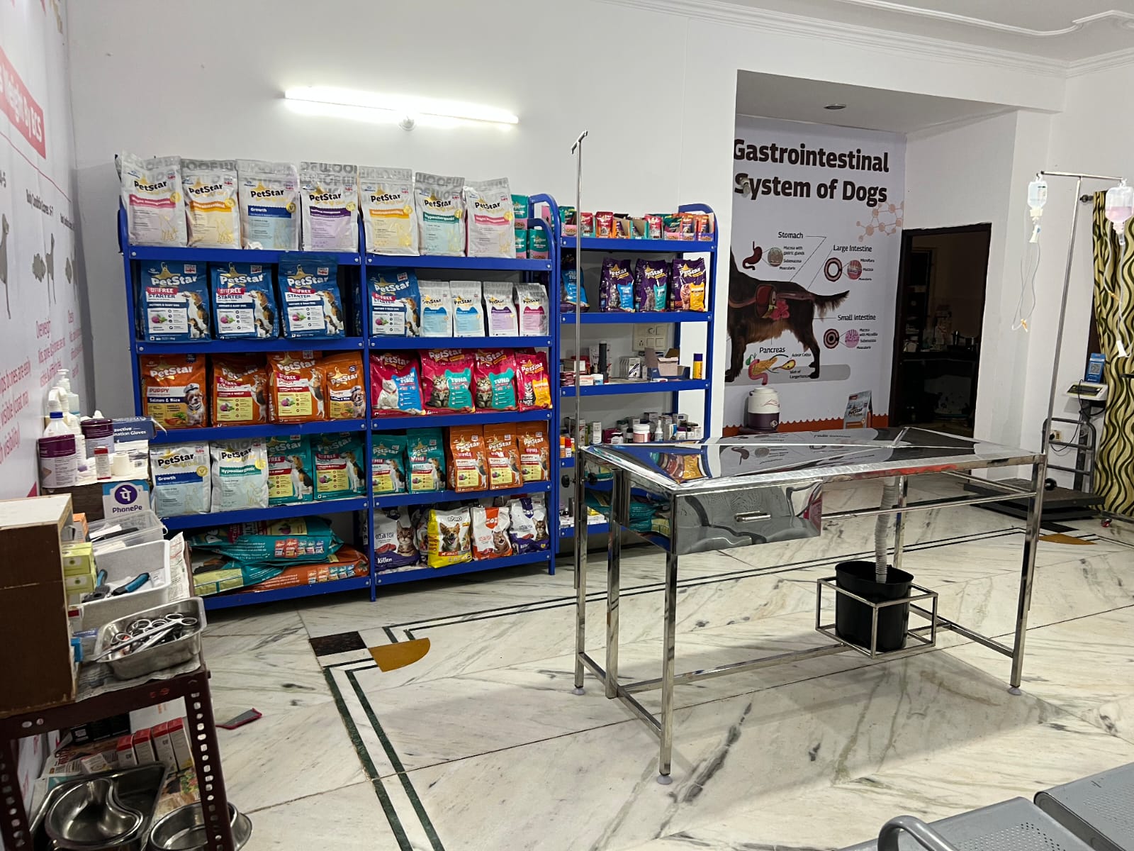 RT Pet Clinic interior with PetStar nutrition shelves and exam table